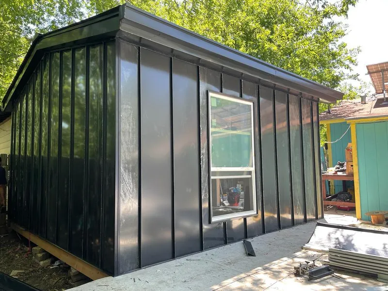 Black standing seam metal wall panels for Metal Roof Installation in Coventry